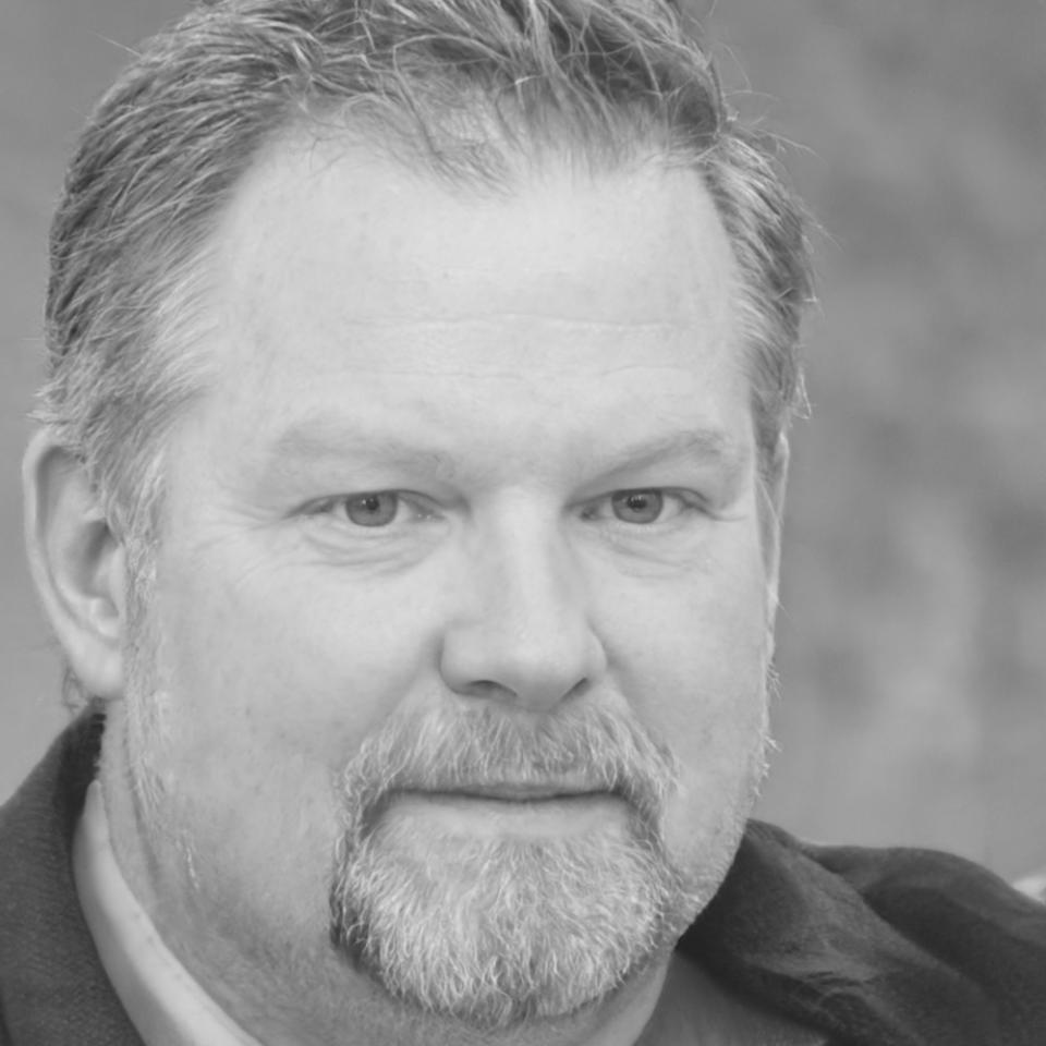 Banking advisor reviewing client financial portfolio during consultation meeting